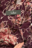 I really love this dress and purchased to wear to a winter wedding, and was super disappointed it arrived with a hole/split seam on the front of the dress. It looks like it wasn't sewn properly to begin with due to the delicate nature of the material. It does seam to begin pretty fitted in the ribcage area, which if it was still in stock I'd order a size up and have it altered for the best fit. Really bummed out about this! - Emily M.