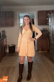 I wore this with boots bought from lulus and I loved how it turned out! I was worried because I have some curves that it would look lumpy on me but it didn't! - Karen S.
