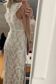 I love this dress. It is perfect for my wedding rehearsal dinner. I always order the size Lulu's recommends based on my past orders and returns, and this fits true to that. It came in a really nice garment bag, too...just need to wear lighter colored underwear! - Taylor O.