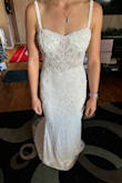This dress was beautiful and it was true to size. The see-through midsection was a little weird with the bra section covered. The zipper got stuck when I was trying to take it off though. - Kenzie M.