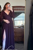 Loved this dress! Fit very well, though my husband says it's a bit bathrobe-y lol. Definitely, a loose and flowing fit if you're trying to cover up for an event. - Mary Z.