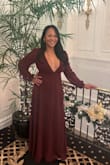 A little snug in the chest. Large would have been too big. Very classy and flattering on all figures. I had to have length shortened, otherwise beautiful dress! - Maria L.