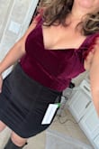 This bodysuit is super cute! Love the details on the sleeve. It was a tiny bit smaller but it had some room stretch. Looked great for my Fall trip! I loved so much ordered in different color. - Bessy B.
