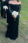 I wore this dress as MOH and got so many compliments on it! It is super flattering while being very comfortable. The arm bands were the tiniest bit tight on me but the stomach area was surprisingly comfortable. It is a bit long as that is the style but it was so elegant I felt beautiful in it. - Isabel R.