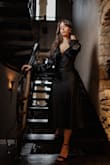The product is exactly like in the picture. The material is too die for. I was outside in the cold and the dress actually kept me warm. The fit was perfect. - Antonia B.