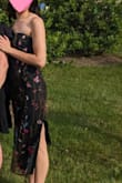 Purchased this dress to wear to my sister's college graduation. Originally ordered my usual size at Lulu's (XS) but could not get the zipper up past where my chest begins. Returned and got size S instead - so much better. The quality of this dress is fantastic - nice black slip with beautiful embroidered layer on top. Nonslip rubber at the top keeps dress in place - did not have to adjust even when standing in blazing sweaty 95°F sun. Received so many compliments and can't wait to wear again. Maybe size up from your usual size but once you do - GIRL it might just be your new fav dress. - Saira S.
