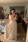 Was such a pretty dress. I didn't end up keeping it because it wasn't exactly what I was looking for but it was still very pretty. - Haley G.