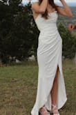 I ordered an extra small and it was just slightly baggy in the mid back. I had to make alterations for that reason. The material is a little difficult to get wrinkles out of but the natural flow of the dress helps mask them. Other than that it was the perfect dress for me. Super elegant and is a statement! - Mattie L.
