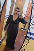 The dress was beautiful not itchy. A little loose and maybe should have ordered a Medium instead of a Large. Elegant dress and comfortable. - ANNA C.