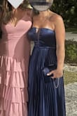 Insanely beautiful. Had to have the dress hemmed (story of my life) originally ordered a M but exchanged for a large to accommodate back and bust comfortably. Compliments all night. Nice heavy fabric as well. A true stunner! - Rosana J.