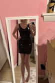 I bought this for New Year's Eve and it is SO cute in person! Glad I got it on sale bc it's definitely scratchy around the edges and I also heard some sequins falling off when I tried it on the second time to show a friend. Not going to wear it again until New Year's Eve and I'm hoping the sequins hold up! I also usually order a medium but I got a small so it's a little short and tight (what I was going for). - Samantha B.