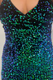 I bought this dress specifically for a holiday party. In the photos it looks green-very green. So it was definitely a surprise when I opened the package and it's blue, purple, green like peacock colors. I will be returning based on that alone but I will also add, there is ZERO support in the breast area, so any moms out there, it's very unflattering. - Megan L.
