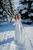 Dress was perfect. Steamed nicely. No bra would work, but Cakes (silicone nipple covers) were perfect. I wore thermal tights under the dress and you could not see them! - Danielle D.