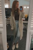 BUY THIS!!! It's so freaking cute! It's sweater material, it's super soft, not super heavy, but perfect for a cooler day. It can be dressed up or dressed casually. It was my go-to all fall. - Melissa L.