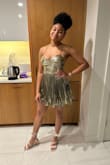 It's ok - it fits true to size, but I would have liked a bit more support in the bust. It's a bit hard to tighten with the straps. Otherwise it was a cute dress. - Lucy E.