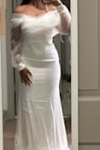 This Dress is Gorgeous and great quality. It fits perfectly (I ordered a small). Very flattering, wearing this for a civil ceremony, but will definitely get it steamed before hand - Madison F.