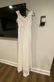 It's a nice dress but material is not what I expected. - Araceli C.