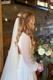 I chose this dress as my wedding dress. It fit me perfectly on the top, I only needed to get it hemmed. I have a small chest and size small fit perfectly. I'm so happy with this dress and it was amazing the whole night. - Abbey R.