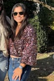 I wore this sequin crop top to Friendsgiving and all my friends loved it! It fits perfectly. The sequins would often get caught on each other and that was annoying but that wouldn't stop me from ordering it again. - Amber C.