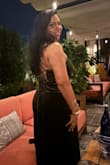 The material is beautiful and has a shimmer to it. The dress has a sexy slit in the front and looks really good on olive tones. - Jyothi S.