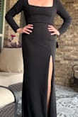 This dress fit like a dream. Was way nicer material than I thought it was going to be. Fit my tall stature. Highly recommend. One thing to note is the slit on the thigh is fairly high. - Rachael B.