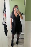 Really happy with this purchase. The detailing on the top portion is very nice. The waist band was a little tight and didn't have too much stretch. The length was perfect for my height of 5 feet and hit almost at the knee. Got an XS in the dress. - Chris C.