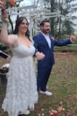 I loved this dress so much and I was so surprised when it came and it fit perfectly right away!! I wasn't expecting to be able to just fit into it and not need any alterations at all. I wore this dress for my wedding in November, which was just a small little park wedding with our immediate family only, and the dress was perfect for that occasion. Not too fancy, not too casual, just right. I loved how the sweetheart top was sexy, but not too revealing and the midi length was ideal for showing off my custom Converse. The only tiny adjustment I made is that I used boob tape to make sure the top stayed flush to my chest and didn't have too much of a gap. Since I have larger breasts, I didn't want to be flashing everyone at my wedding. But other than that, the rest fit like a glove and was super comfortable to wear. I loved the flower applique and got so many compliments on it as well. Would definitely recommend!! - Ashley R.