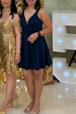Simple dress, but you could hype up your look with heavy make up and jewels, then it will carry on. Pretty good for the price. - Em B.