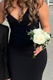 It fits well, like a glove, but you do need to wear heels if you are 5'3". The material is stretchy, so keep that in mind when ordering; you may need to order a size smaller. I ordered a Small and a Medium and ended up wearing the Small. - Ingrid M.