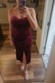 I don't usually write reviews or order clothing online without trying it on, but this dress proved to be a WINNER! It fits perfectly, looks super expensive and the color is beautiful. The fabric is a little stretchy which is nice. Don't think about it...buy it! - Natasha N.