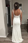 This dress is perfect, the material feels like a pretty good quality. - Melissa M.