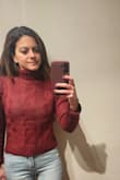 This is such a cute sweater! The color is awesome. Runs just a little tight so if you prefer comfy sweaters, just order a size up! I gave it a 3 because the fabric irritated my neck a bit, if they had it without a turtle neck would have definitely kept it ! - Nour G.