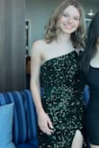 I purchased this dress while it was on sale for a great price. It is absolutely unreal! The green color is so stunning in real life and shines beautifully. The slit allows for some leg action but isn't too high. I felt beautiful in this for a sorority formal. - Ali S.