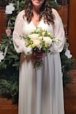 I am 5'6 about 170-180lbs, normally a size L, and I ordered an XL. I had some extra room in it, as I preferred things a little bigger rather than too small. I did get the dress slightly hemmed to wear with flats. It was super comfortable and wore it for my church wedding ceremony! Loved it! - Emily D.