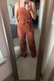 big fan of corduroy so of course I needed this. Also, jumpsuits for short gals! I am wearing a 3" heel in the photo. I do like this and think it's solid quality. This doesn't feel too heavy or too light. Yes, there are two pockets as well, which is ideal. - Brandie R.