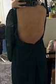 My size is normally S, but this dress is too small. I can't zip it up. - Erika U.