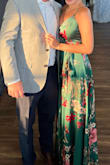 I wore this to a wedding and got so many compliments, the green color is so flattering. It was long, but normally everything is because I'm short. The material is nice and it fits perfectly around my chest and torso. I recommend this dress, especially for wedding guests. - Laura H.