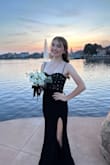 The dress is stunning! However multiple gems fell off immediately after trying it on for the first time. The zipper would only go down 1/2 way, making it much harder to get on and off. And after wearing it for pictures and the school dance, parts of the material have started to ball up and become rough. - Erin M.