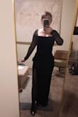 Bought this for a New Year's black-tie wedding in Oregon. The shoulders keep trying to slip off and it's definitely too long but that's pretty common for me because of my height. There is NO ZIPPER so be prepared to wiggle into it. The color/fabric is fairly forgiving of small lumps and bumps but I'd still wear shapewear if you want everything to be smooth. They put the hanging straps in the mesh shoulders so you will have to carefully remove them in order to wear. - Shelby S.