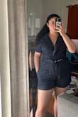 Cinched at the waist which I love. Very comfortable and looks business/ classy. I ordered my recommended size (XL) and it fits right. - CINTHYA S.