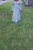 The dress was beautiful and fit my body perfectly. It was a bit too long for my liking, so I took it to a tailor to be shortened. Otherwise, I absolutely loved it. - Angela W.