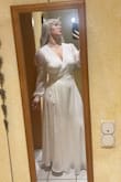 I had to get the dress hemmed a few inches since it was very long. Other than that&.it was AMAZING! So flowing and with a perfect weight. - Melinda K.