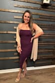 I loved the way this dress hugged my curves. Wouldn't recommend for busty women as the string has a lot of stretch not providing much support up top. Over all, loved the dress. I added a shawl for elegance. - Lindsey G.