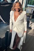 I wore the dress as a retirement outfit. It was stunning! I needed breast tape and double-sided tape to hold everything together; however, once I was taped in, everything was perfect! - Khadija B.