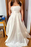 I absolutely love this dress; if I had picked it, I would have removed the bows except for the top one. If you are looking for that classic strapless look for your wedding, this is the one! Super comfortable, pockets and large skirt. - Krystyna K.