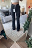These pants are a stretchier material than I had anticipated but very comfortable! I wasn't sure about the size because I am normally 0 or 00. But the size one fit almost perfectly. I am 5'7, and I do need to get them hemmed at the bottom, as I would only be able to wear them with boots/heels at present. - Molly K.