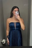 Absolutely the most perfect dress ever!!! 
Wore this to a formal and got so many compliments! Paired it with silver shoes and jewelry. Quality was amazing, sewn in pads. For someone as flat chested as me, the girls looked good lol.
I'd buy this in 100 colors if I could, especially for the price it is! - Lily H.