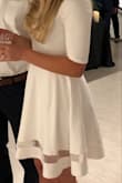 Loved wearing this dress. Good quality. Wore it for my bridal shower and got lots of complements. Fits true to size - Danielle C.