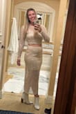 This set is so cute! I sized up based on reviews (I'm normally between medium and large depending on the item) and it was perfect! I wore it to my company holiday party and received so many compliments. If you are busty you might have trouble with the bandeau but it worked well for me. - Lindsey S.