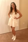 I wore this for my bachelorette party and I loved it! The structured deep V front was a dream. It showed the perfect amount of skin, and the wire held it in place so there was no slippage. - Caitlin V.